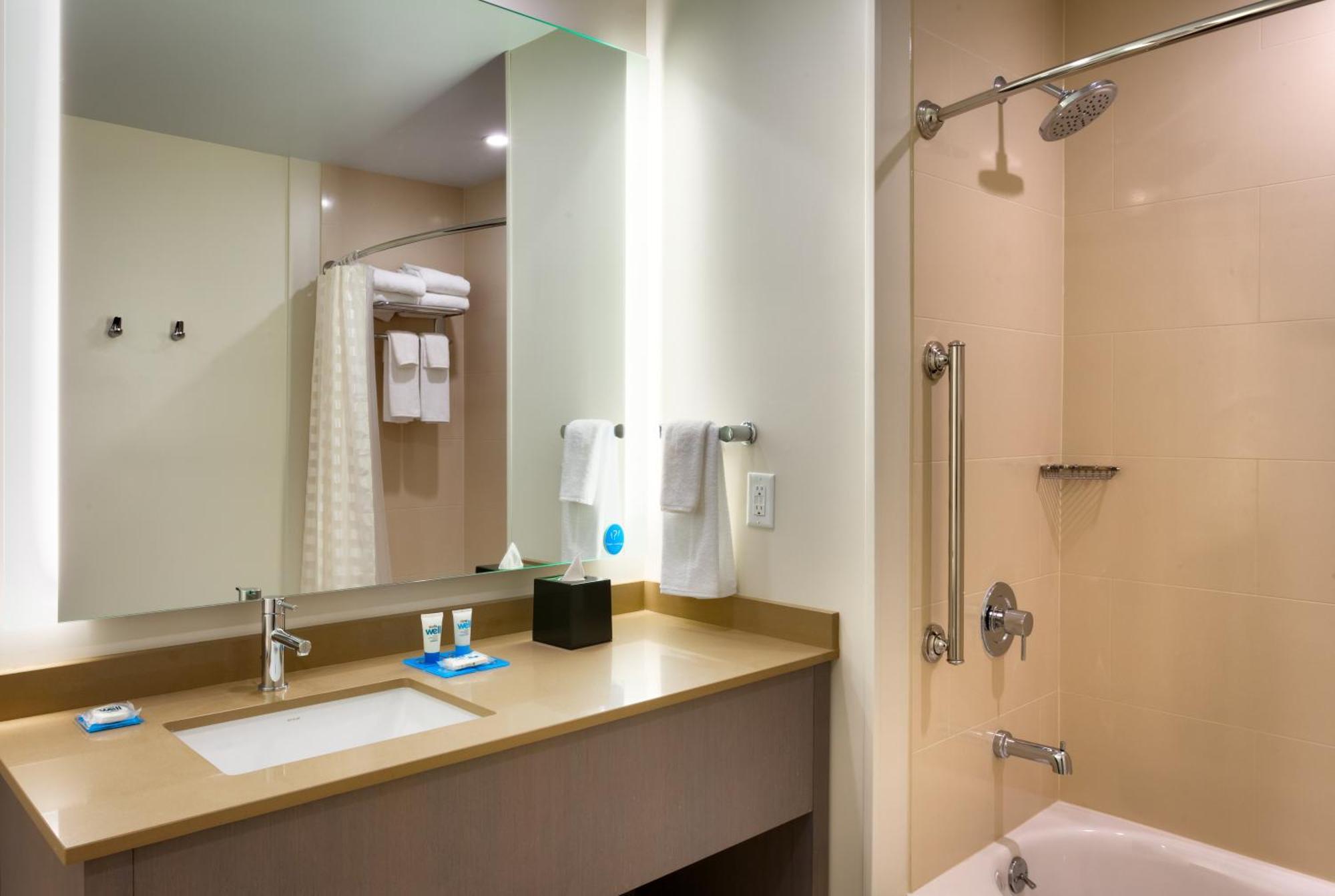 Specialty One-Bedroom Corner Suite with Two Queen Beds, Sofa Bed and Kitchen