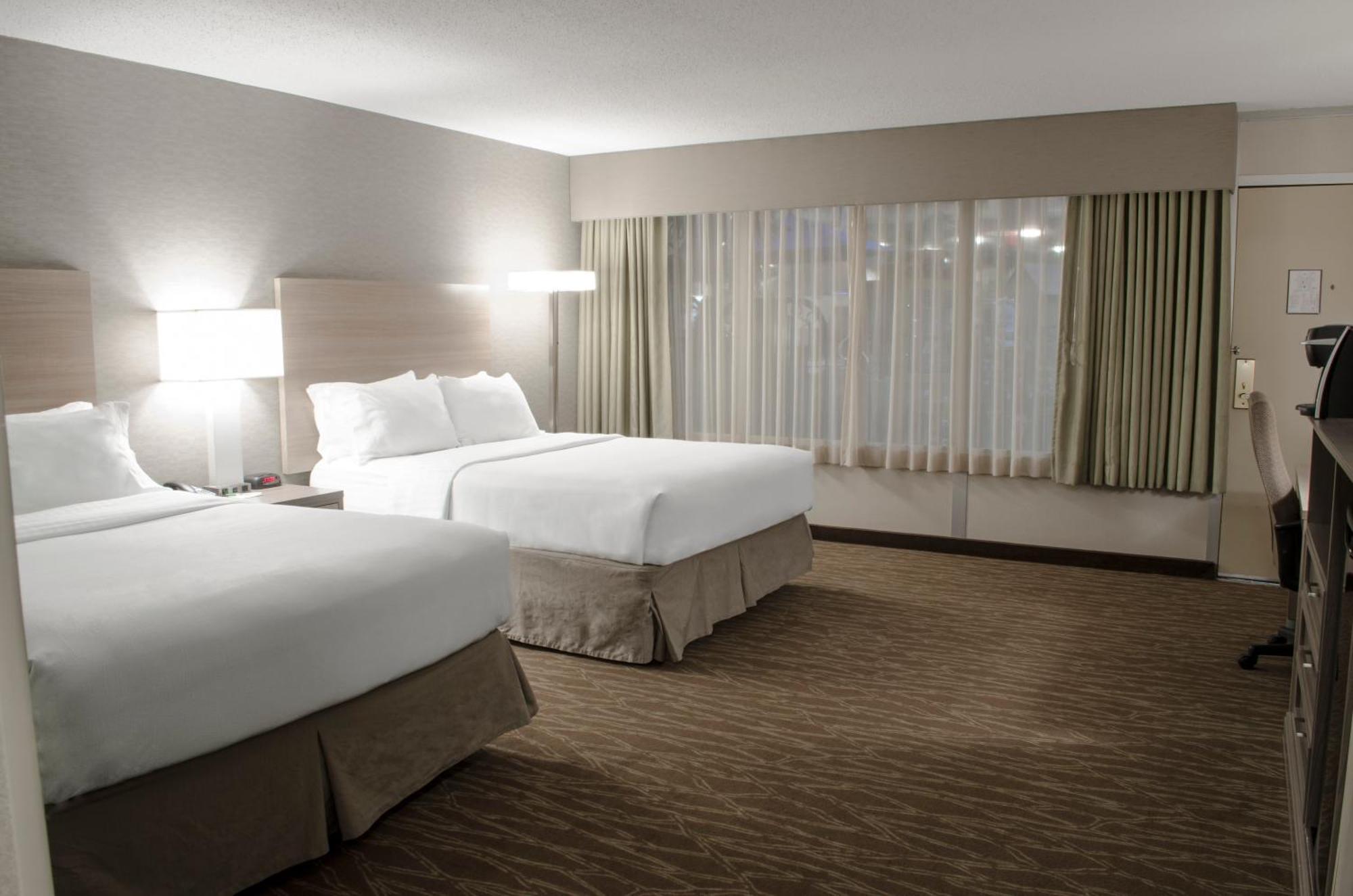 Standard Queen Room with Two Queen Beds and Pool View