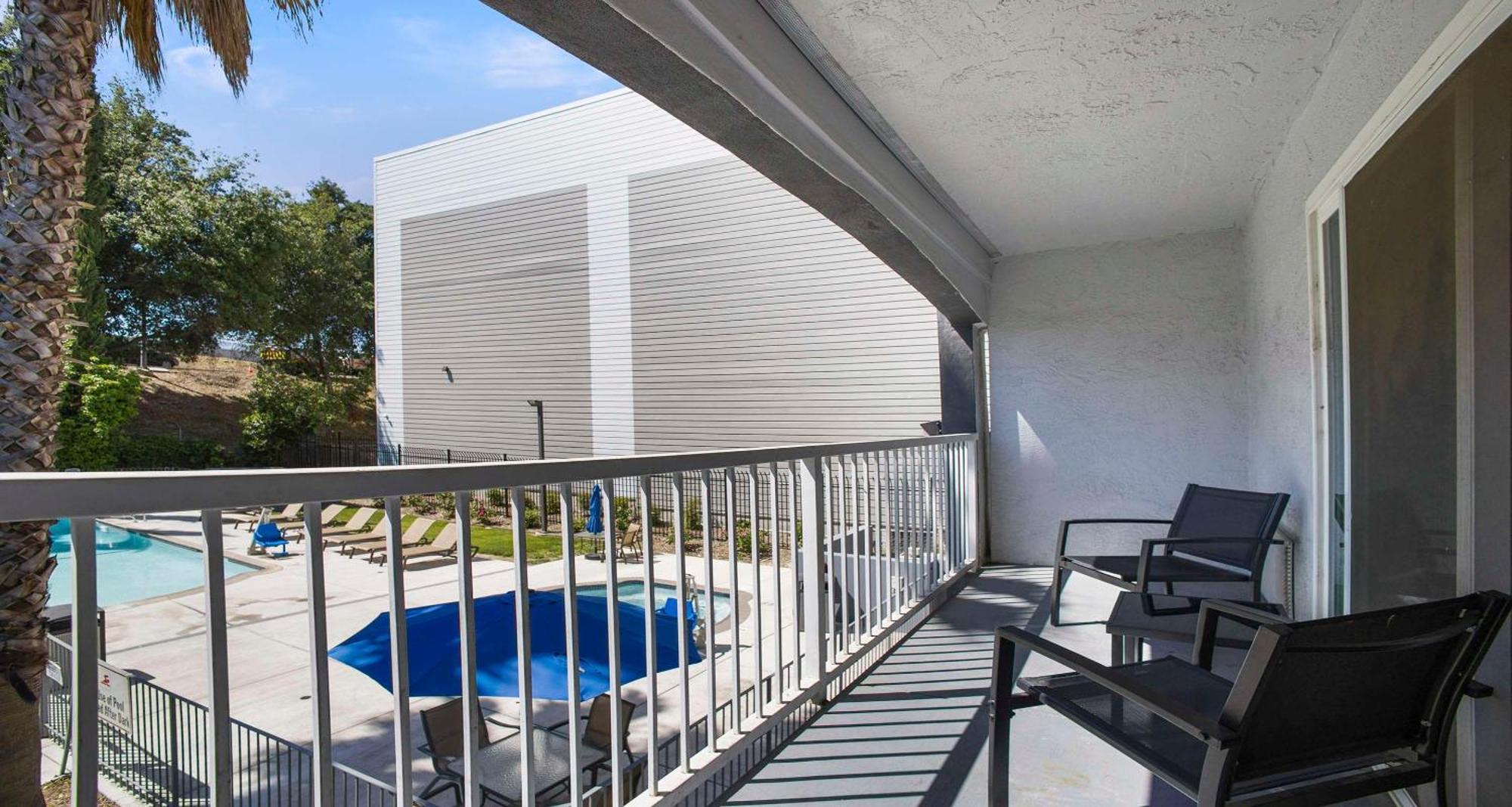 Queen Room with Two Queen Beds with Balcony - Pool View