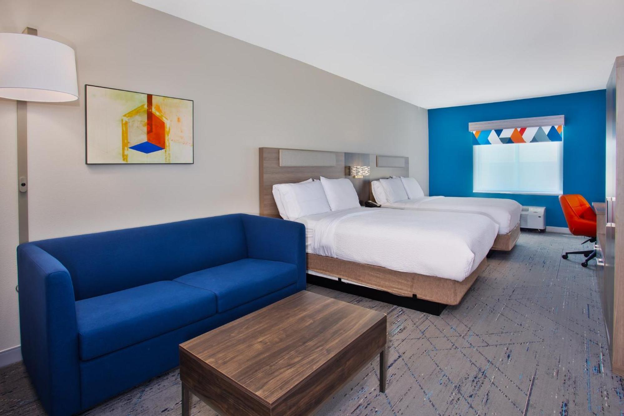 Queen Suite with Two Queen Beds and Sofa Bed