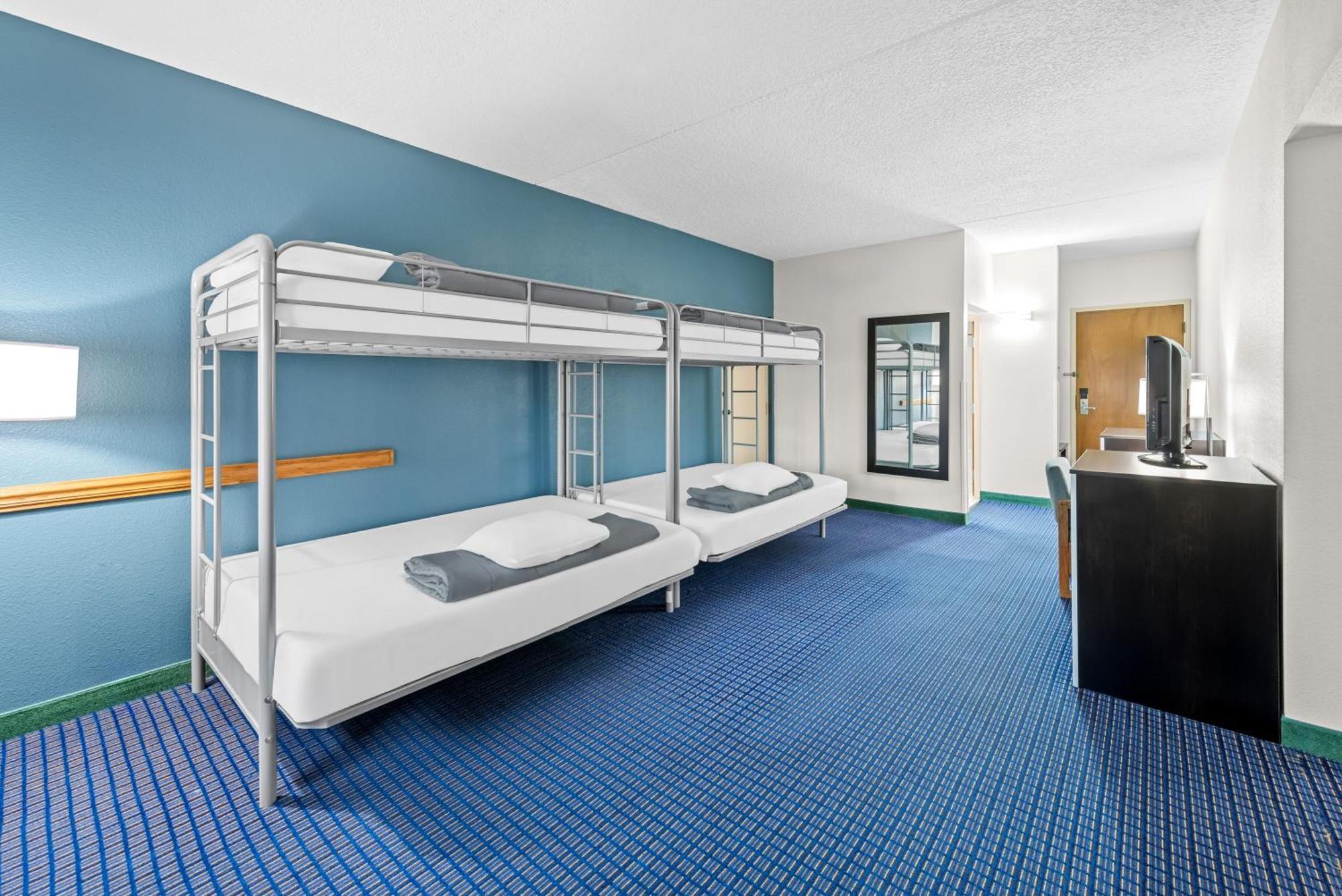 Suite with One King Bed, Two Double Beds and Two Single Beds - Non-Smoking