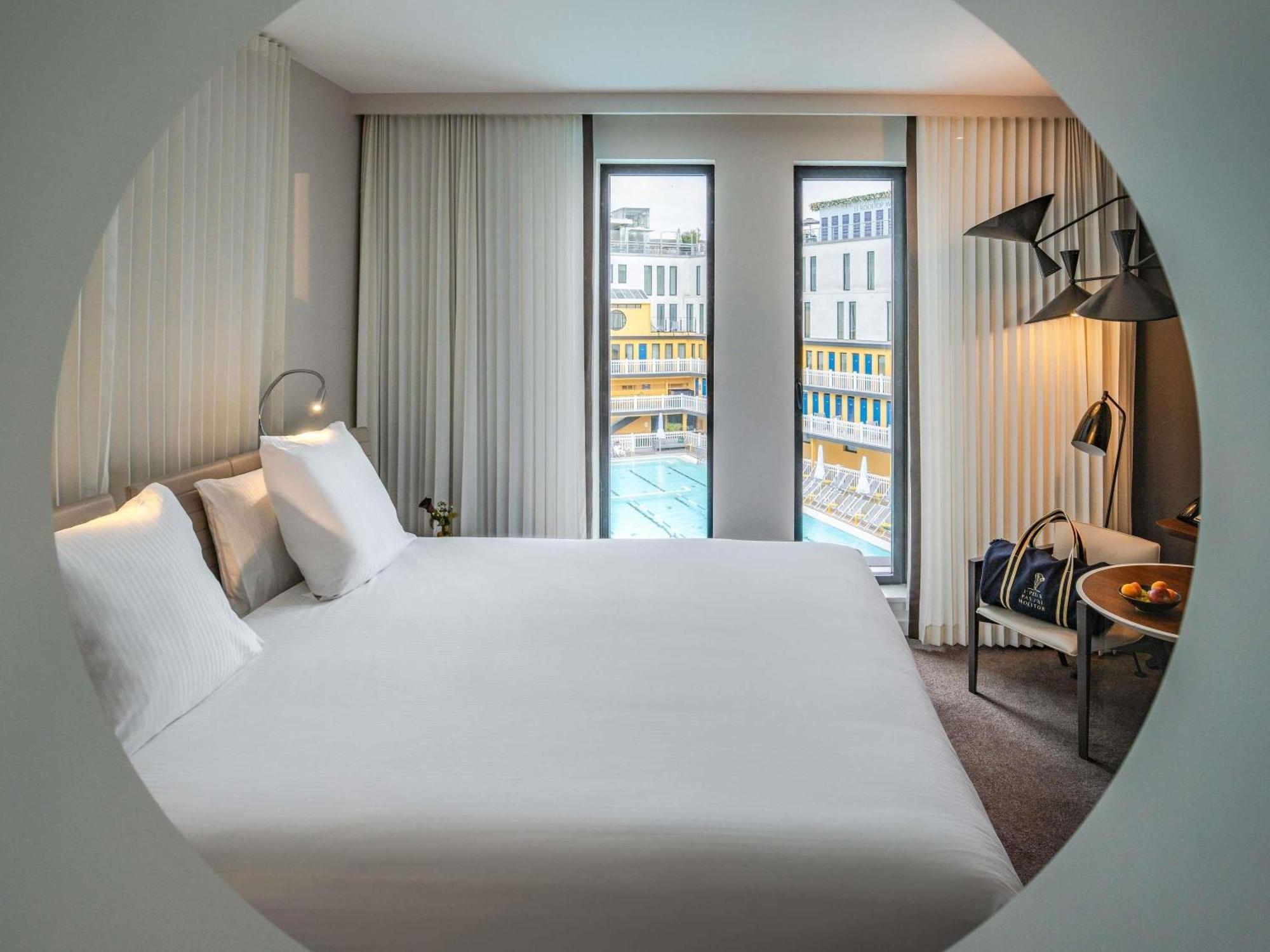 King Suite with Sofa Bed and Lounge Area - Pool View
